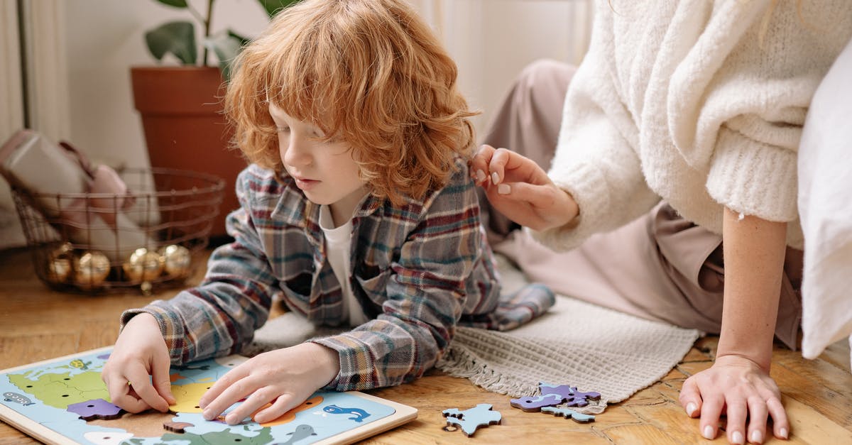 The Ninjas of Marvel Puzzle Quest - Child Playing Puzzle with Mother at Home