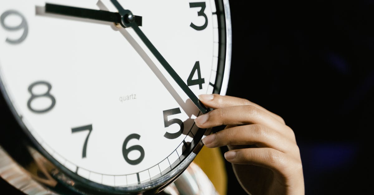 There’s only one hand on my Fez Clock - Person Holding White Analog Clock There’s only one hand on my Fez Clock - Person Holding White Analog Clock