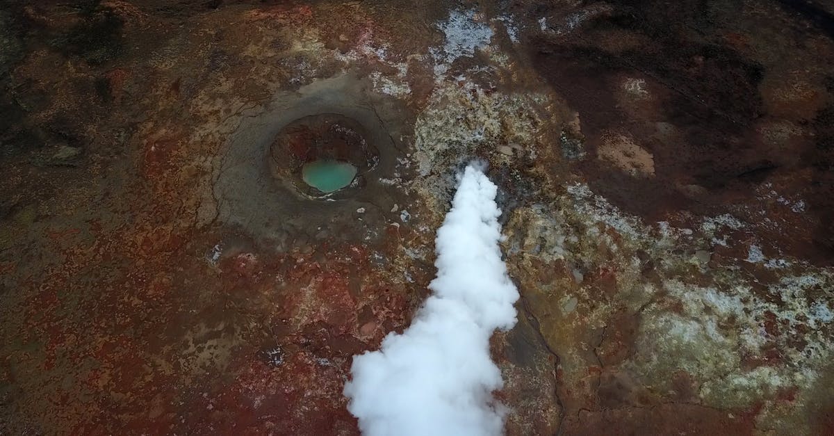 Thermal stone not working - Volcanic terrain with steaming fumarole and mud pool Thermal stone not working - Volcanic terrain with steaming fumarole and mud pool