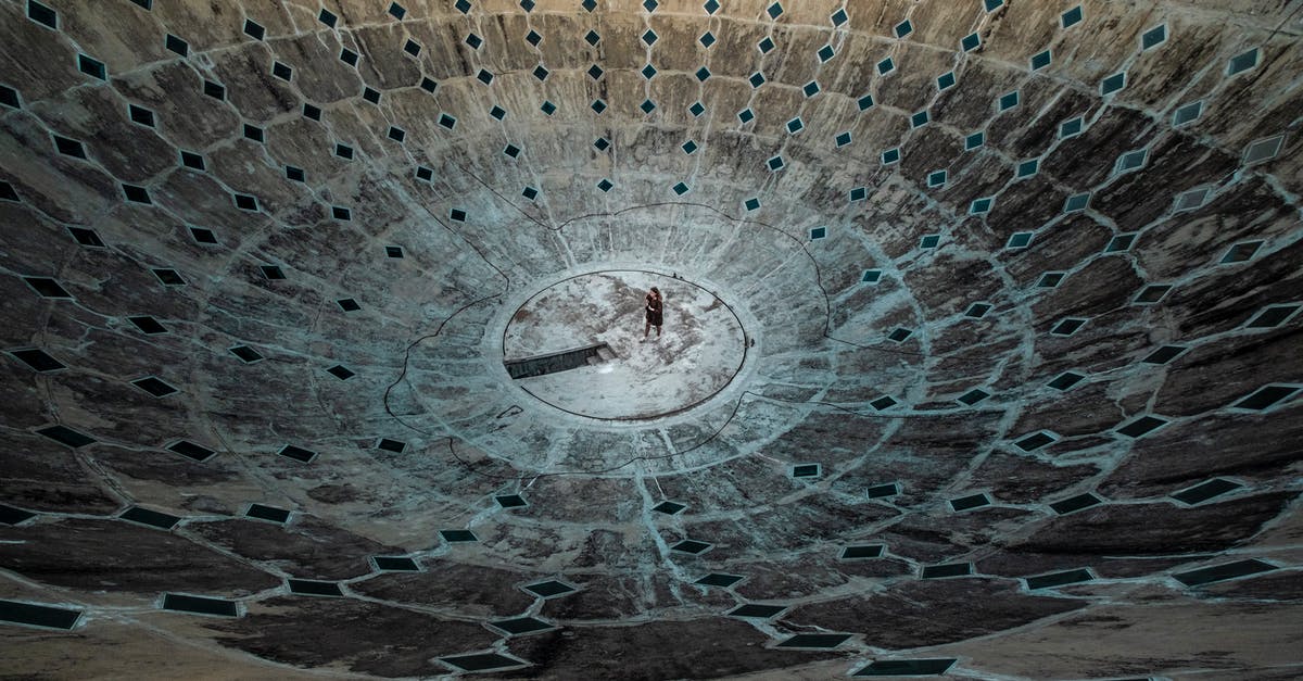 throwing the ball: smaller circle vs closer to the center of the circle - Brown and Black Round Concrete Surface throwing the ball: smaller circle vs closer to the center of the circle - Brown and Black Round Concrete Surface