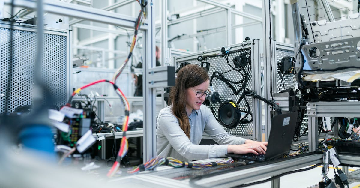 Ticket Request for Level Advancement Not Going Through - Photo Of Female Engineer Working On Her Workspace