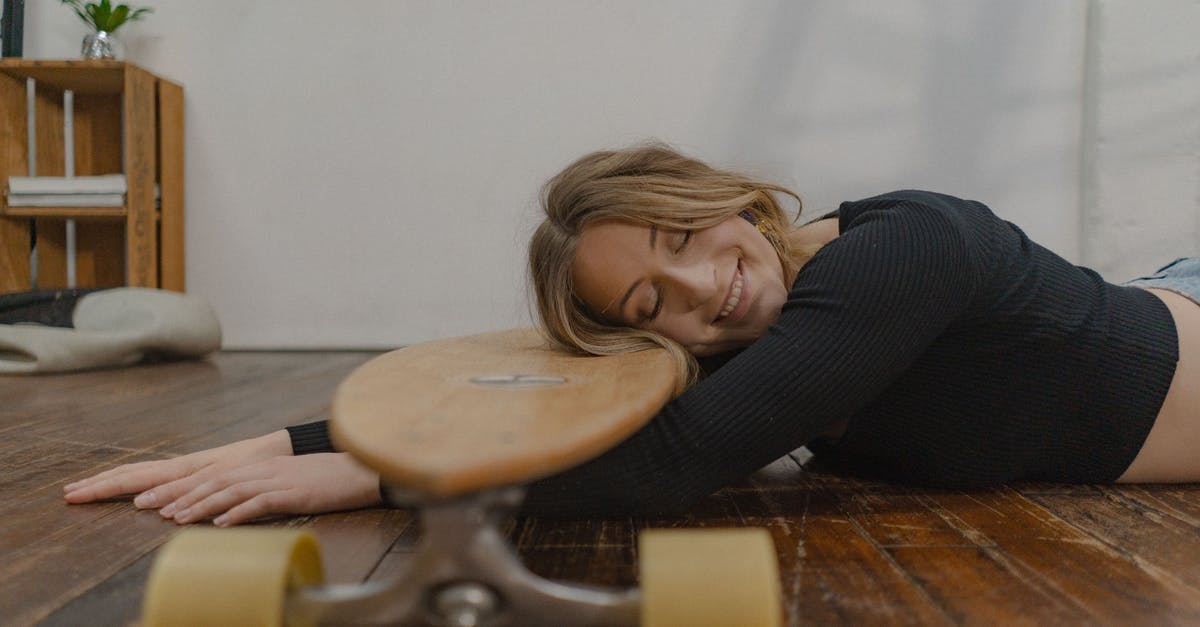 Tires stuck in the floors, what is the use? - Woman Lying with Her Head on Skateboard Tires stuck in the floors, what is the use? - Woman Lying with Her Head on Skateboard