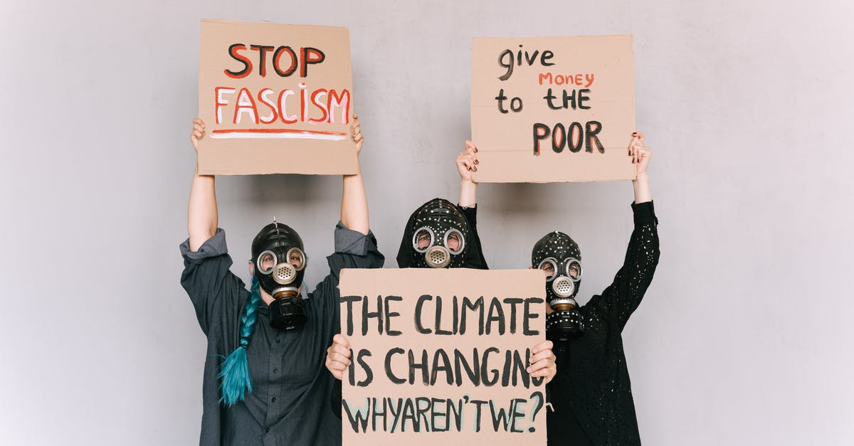 Total War: Warhammer, Difference between story and grand campaign - Three People With Gas Masks Holding Posters Total War: Warhammer, Difference between story and grand campaign - Three People With Gas Masks Holding Posters