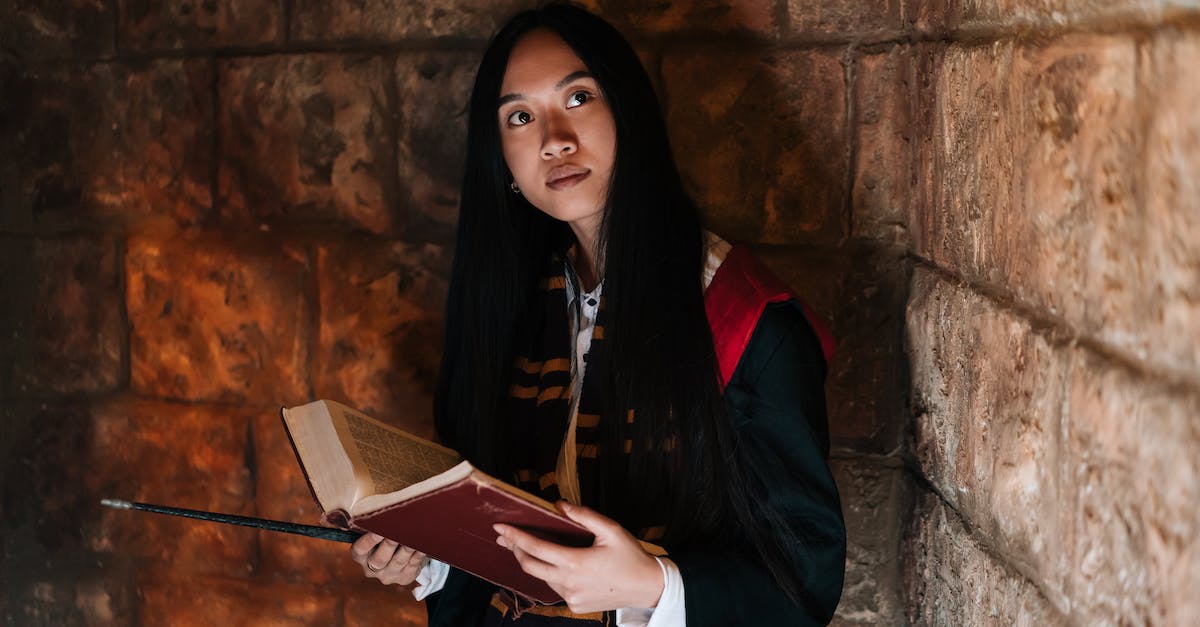 Tower Outta Nowhere quest breaks when I give GOG book to the wizard - Woman in Black and Red Robe Holding a Book Tower Outta Nowhere quest breaks when I give GOG book to the wizard - Woman in Black and Red Robe Holding a Book
