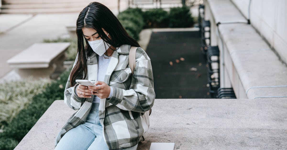 Town of Salem: Scrolls - Lady sitting on fence with phone and tablet in mask Town of Salem: Scrolls - Lady sitting on fence with phone and tablet in mask