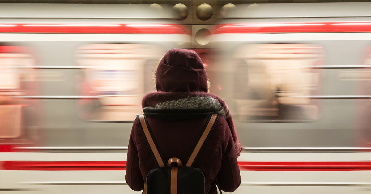 Train Pokemon fast or slow method? - Standing Woman Facing a Speeding Train Train Pokemon fast or slow method? - Standing Woman Facing a Speeding Train