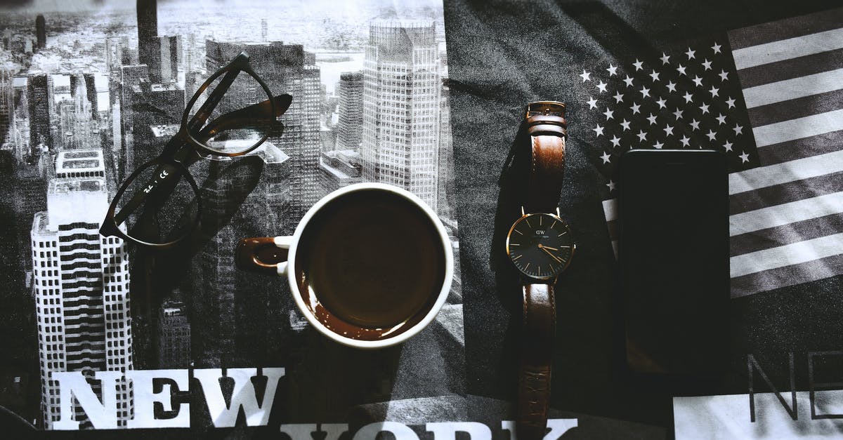 Transfer Minecraft PE from iPhone 4 to new iPhone - White and Brown Mug Beside Brown Watch