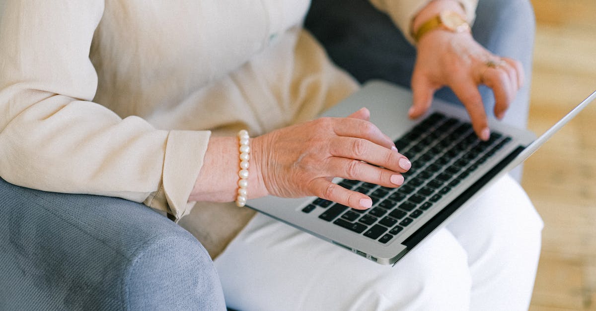 Transferring specific data from an old PS3 to a new one? [duplicate] - Senior woman typing important report on keyboard of laptop