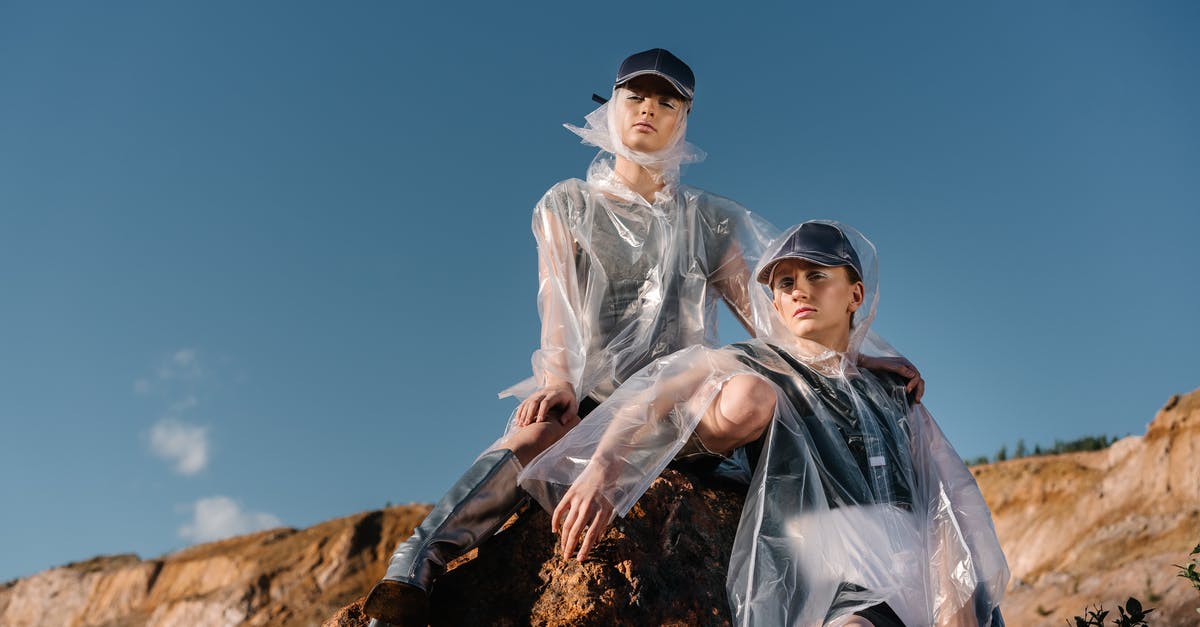 Transparent viewmodels on TF2 - Man and Woman Sitting on Brown Rock
