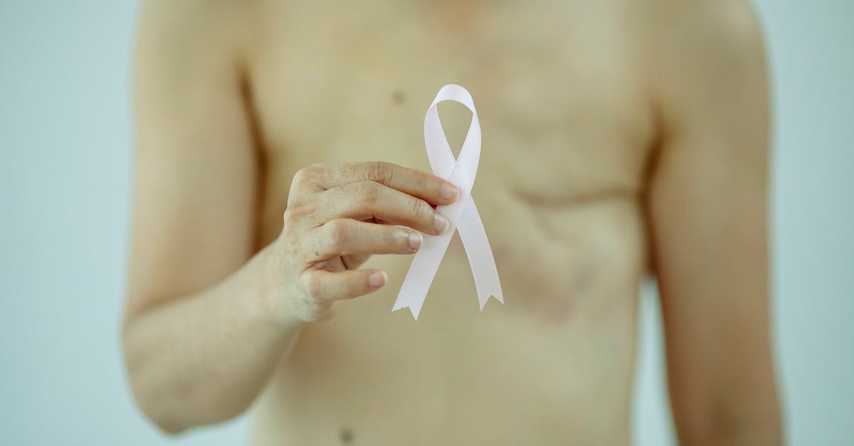 Trouble doing password co-op in Bloodborne with specific symptoms - Crop anonymous female with breast cancer showing ribbon on white background of studio Trouble doing password co-op in Bloodborne with specific symptoms - Crop anonymous female with breast cancer showing ribbon on white background of studio