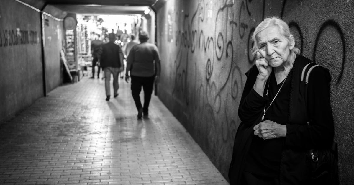 Trouble running Path of Exile - Sad elderly woman standing in passage Trouble running Path of Exile - Sad elderly woman standing in passage