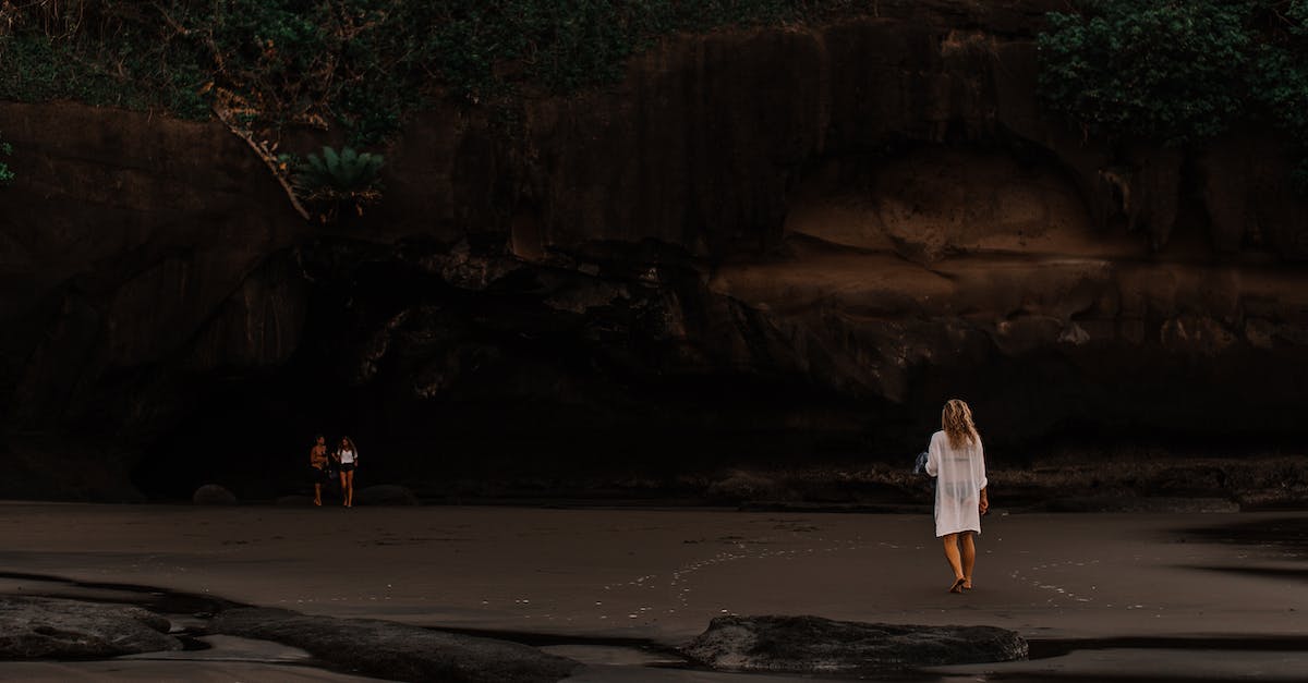 Unable to activate Fabled Cave - Woman in White Dress Standing on Beach