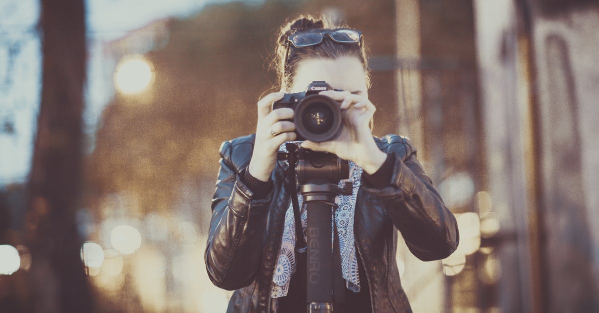 Unable To Capture The Last City in a Region? - Woman Holding Dslr Camera Unable To Capture The Last City in a Region? - Woman Holding Dslr Camera
