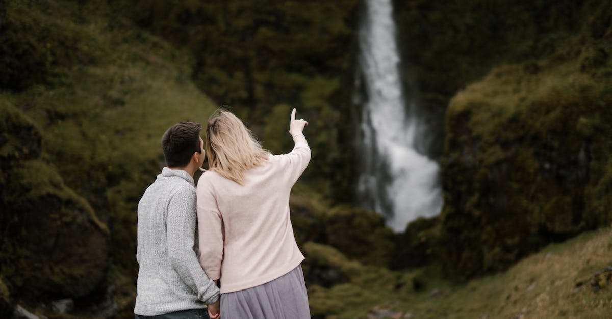 Unable to get to a point in Yeti Valley - Loving couple admiring waterfall on mountain slope