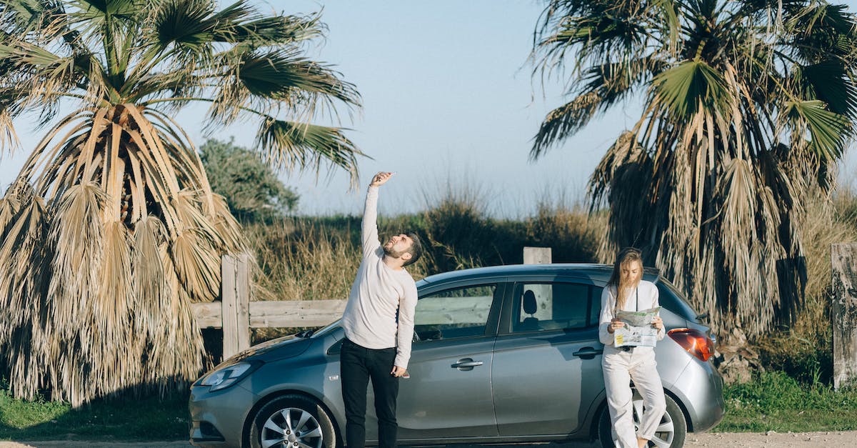 Understanding map coordinates in 7 Days to Die - Woman and Man Wearing Long Sleeve Shirts Standing Beside a Car Understanding map coordinates in 7 Days to Die - Woman and Man Wearing Long Sleeve Shirts Standing Beside a Car