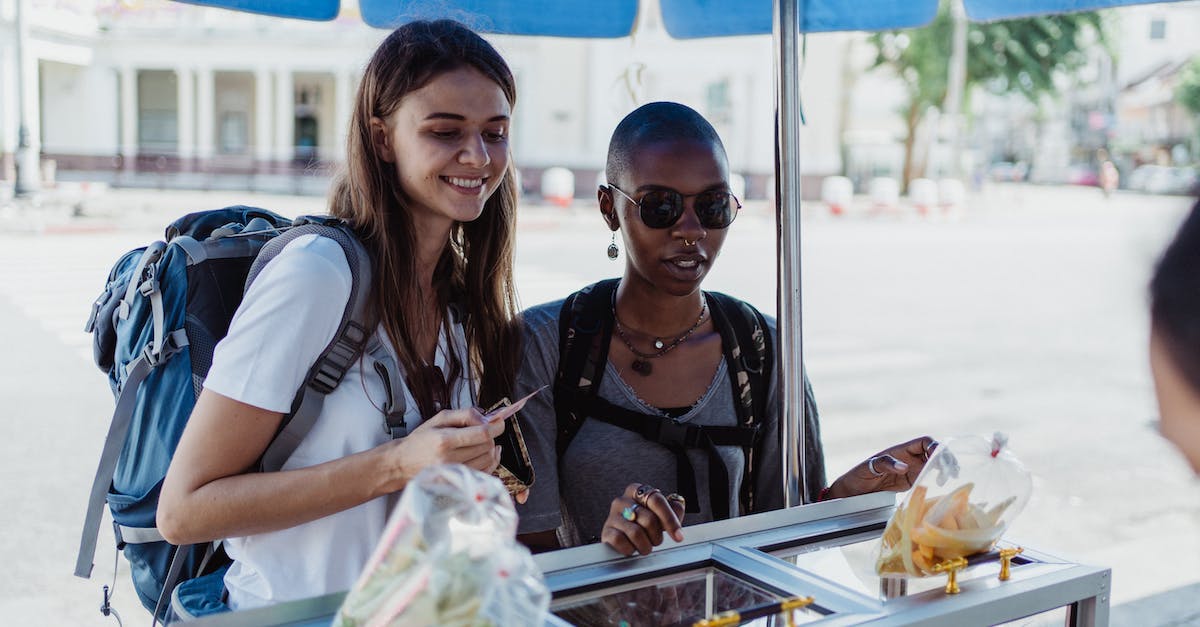 Understanding my trips to other cities - Women Looking at Street Food Understanding my trips to other cities - Women Looking at Street Food