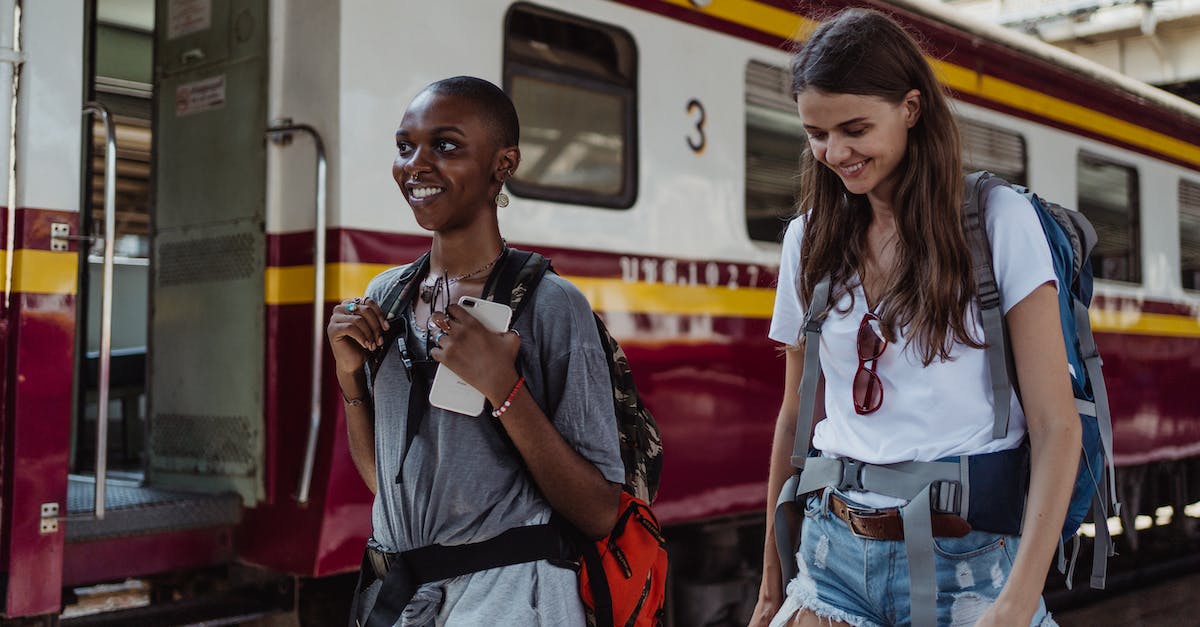 Understanding my trips to other cities - Women Walking near Train Understanding my trips to other cities - Women Walking near Train