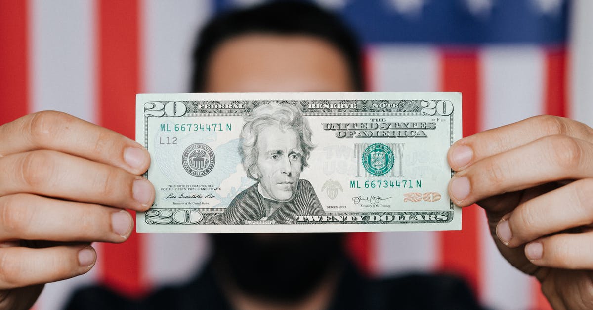 Undo path that leads to $20 DLC purchase on Fire Emblem Fates - Unrecognizable man showing 20 American dollars