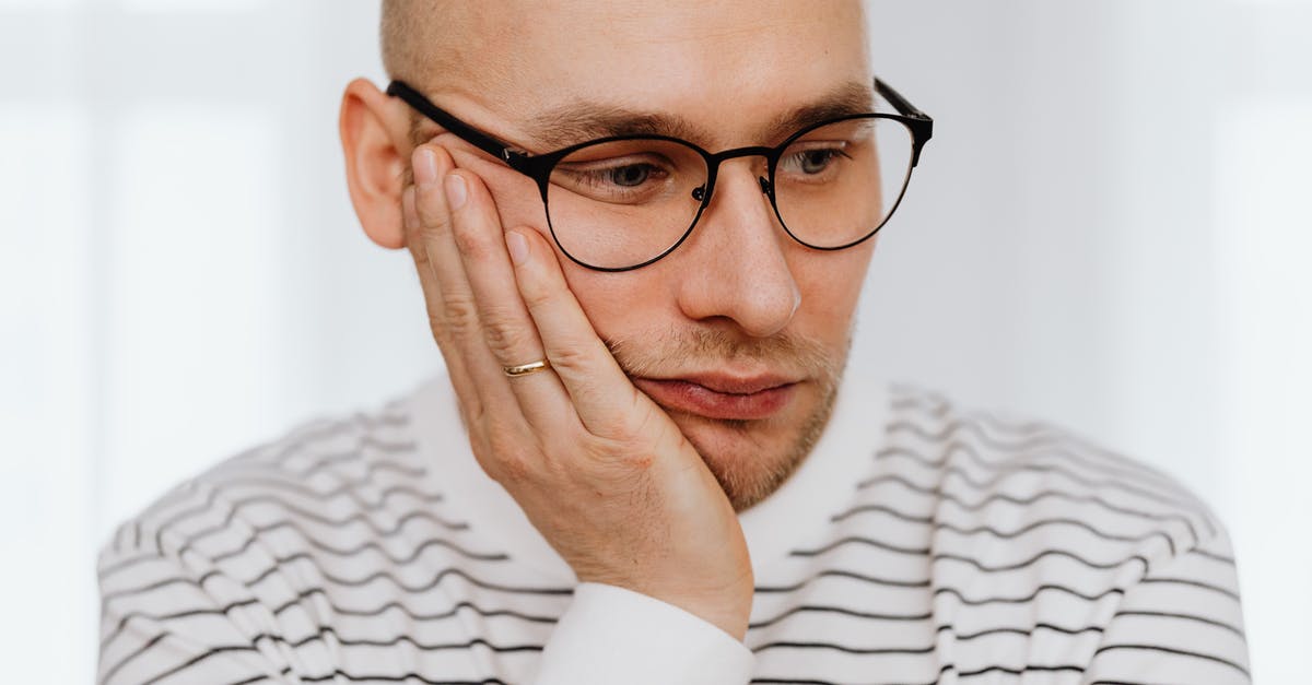 Unhappy dweller due to unseen corpse - Unhappy Man in Glasses Thinking 