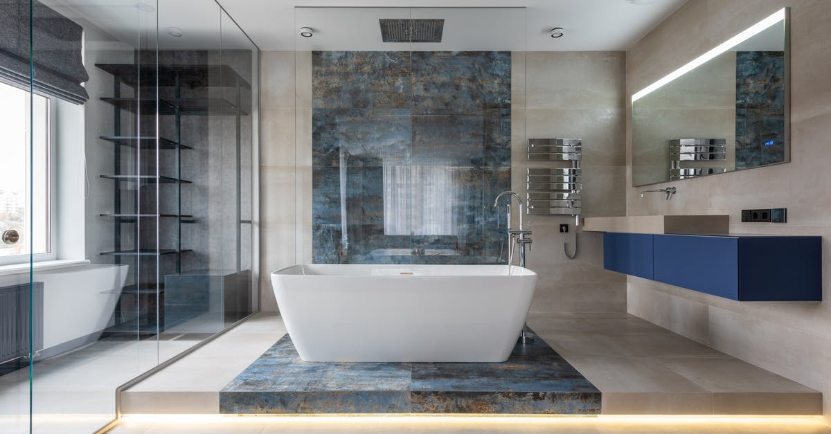 Unit list -or- next/prev unit? - Modern bathroom interior with freestanding tub