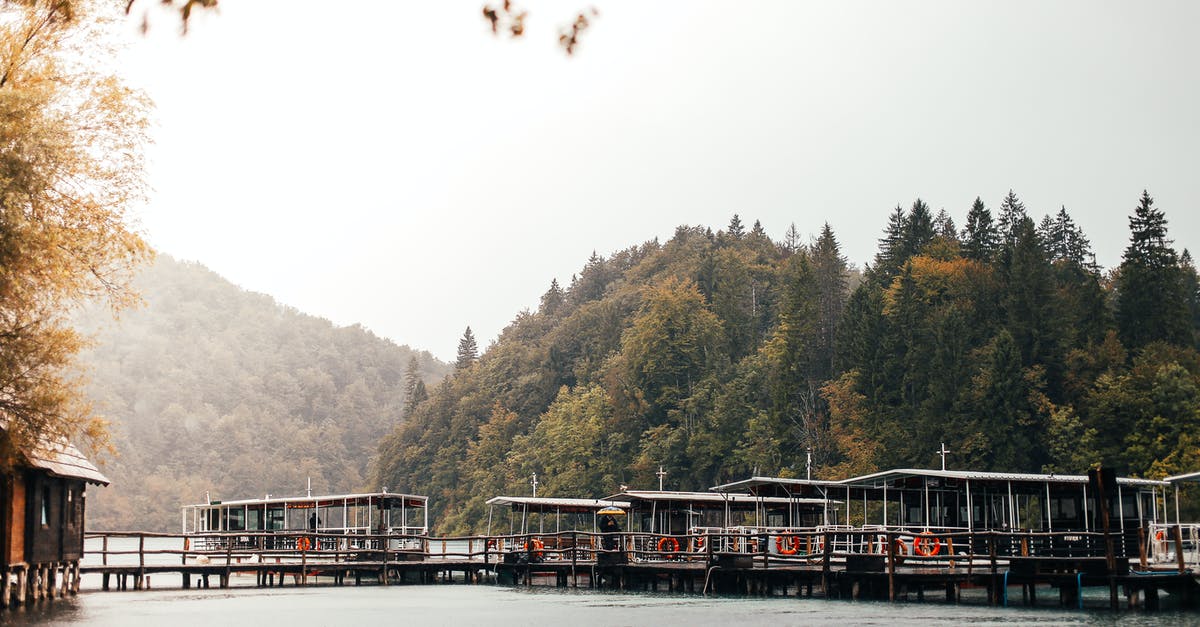 Unrideable boats - Autumn Landscape with a Pier on the River Unrideable boats - Autumn Landscape with a Pier on the River