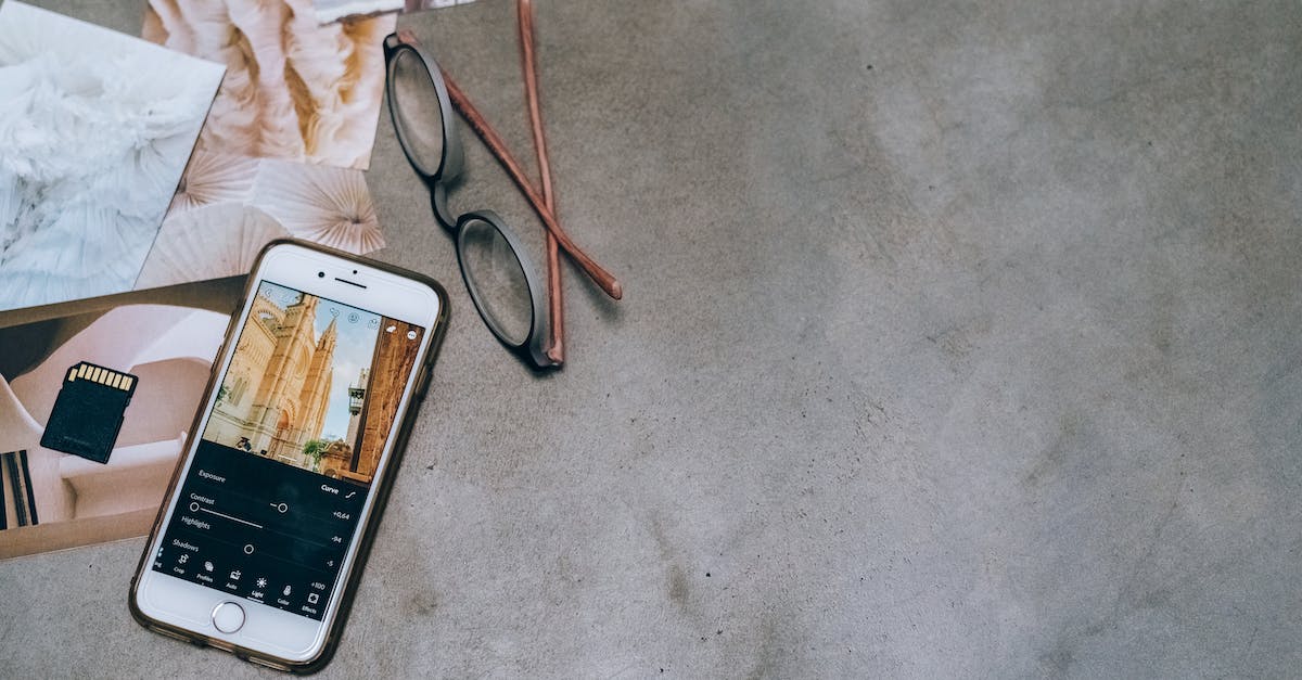 Upgrade edition of GTA V? - Silver Iphone 6 on Gray Textile