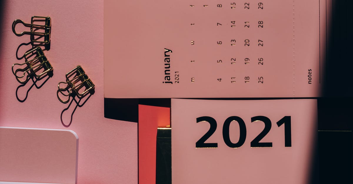 Upgrade from 3-Months to a Year of Playstation Plus [duplicate] - Overhead view of contemporary calendar with weekly dates near metal clips on office desk