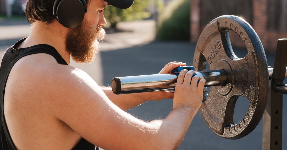 Using /blockdata, won't put certain items in chest - Crop hipster sportsman preparing barbell before exercising on street Using /blockdata, won't put certain items in chest - Crop hipster sportsman preparing barbell before exercising on street