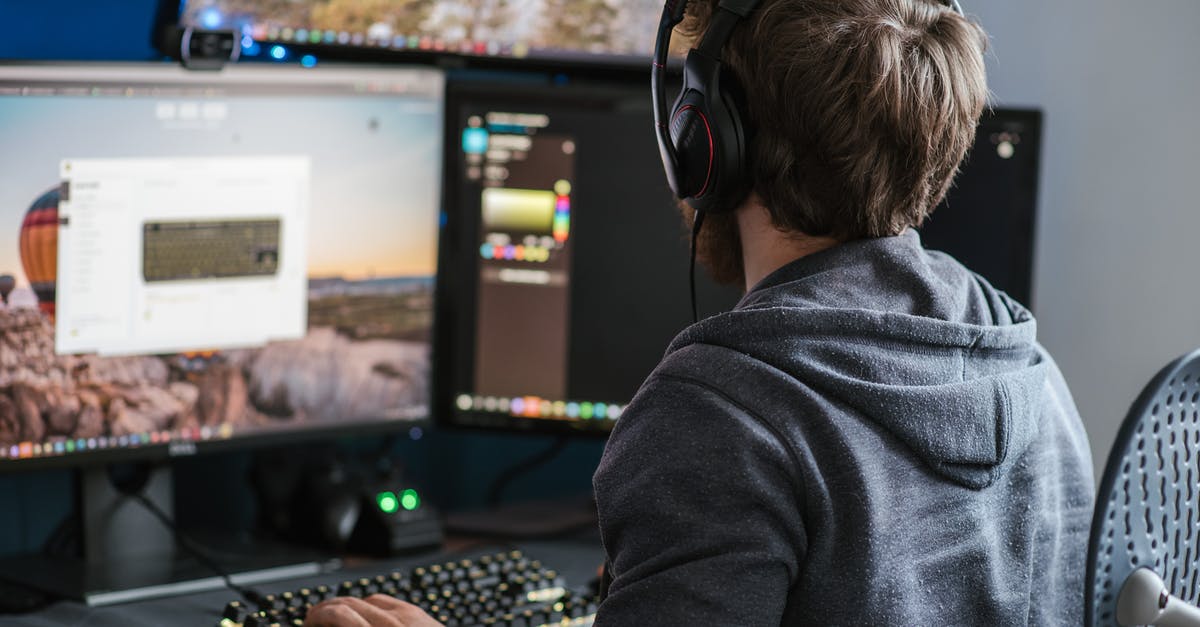 Using multiple accounts to earn achievements on Steam - Unrecognizable man working on computer at home Using multiple accounts to earn achievements on Steam - Unrecognizable man working on computer at home