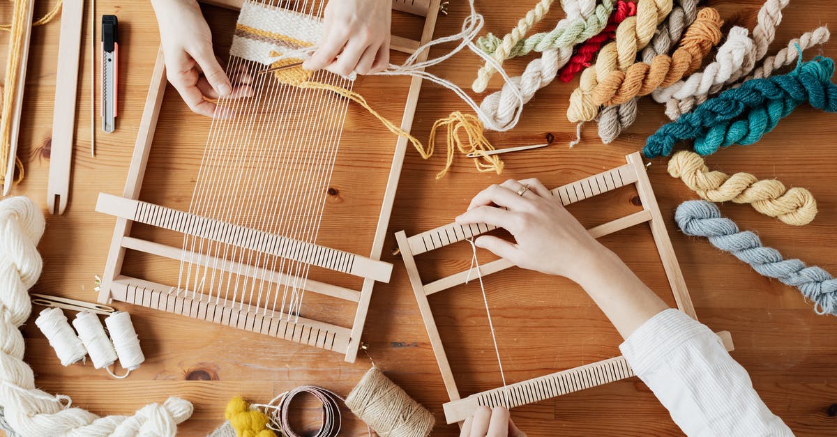 Using NBT tags in crafting - Top View Photo of Two Person's Hands Weaving