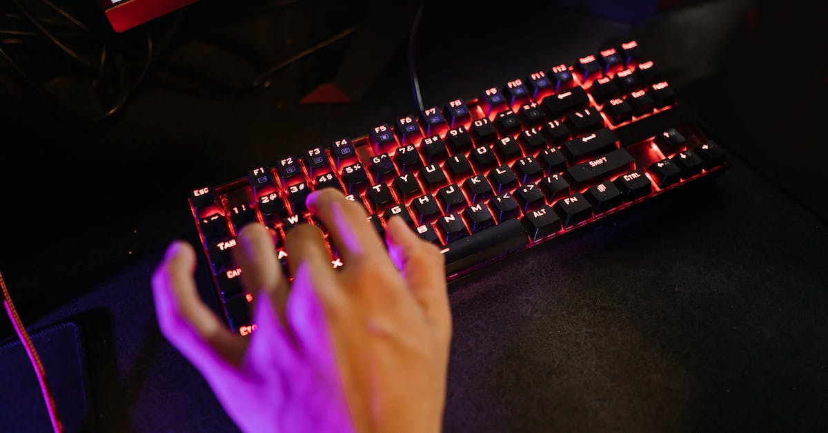 Using second hand Skylander games - Close-Up Photo of Person's Hand on Mechanical Keyboard Using second hand Skylander games - Close-Up Photo of Person's Hand on Mechanical Keyboard
