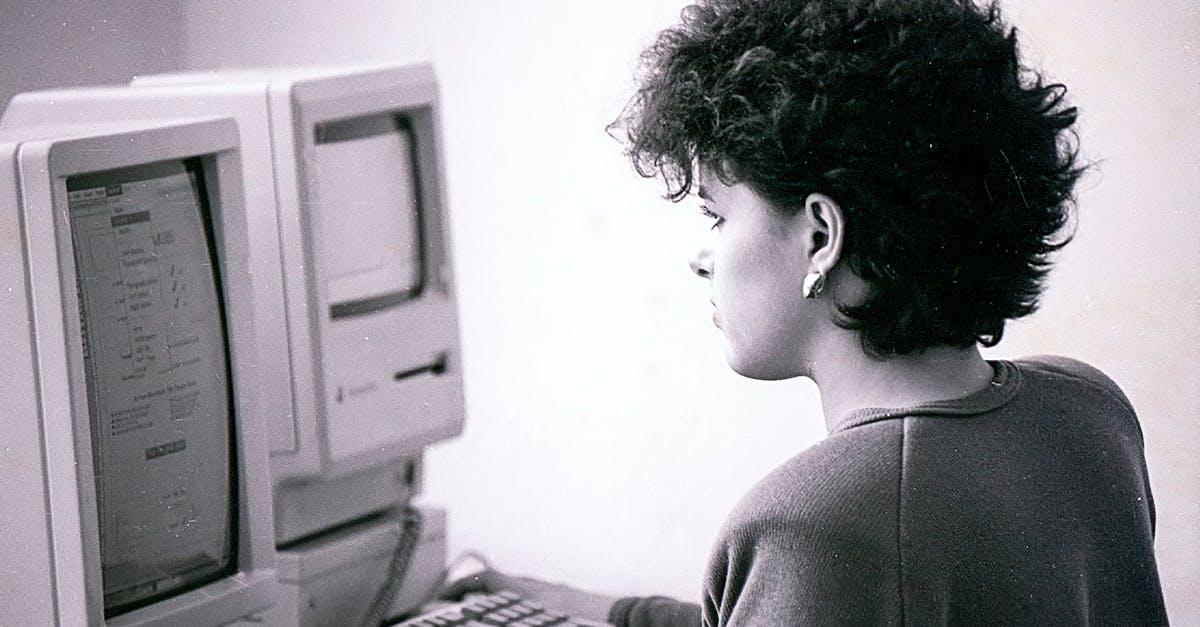 Using Spotify on Zombies 5K - Grayscale Photo of Woman in Long Sleeve Shirt Sitting in Front of Computer Using Spotify on Zombies 5K - Grayscale Photo of Woman in Long Sleeve Shirt Sitting in Front of Computer