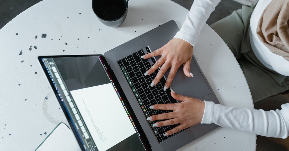 Varghidpolis never uses Apoptosis, why? - Person Using Macbook Pro on White Table Varghidpolis never uses Apoptosis, why? - Person Using Macbook Pro on White Table