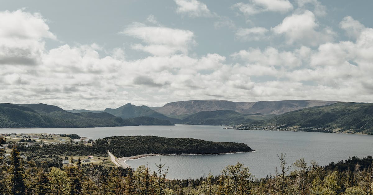 Villagers still not breeding - Panoramic View of Lake Surrounded by Hills and Mountains Villagers still not breeding - Panoramic View of Lake Surrounded by Hills and Mountains