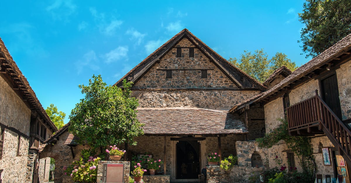 Villages on "Old" Worlds? - Old Stone Wall Architecture against Blue Sky