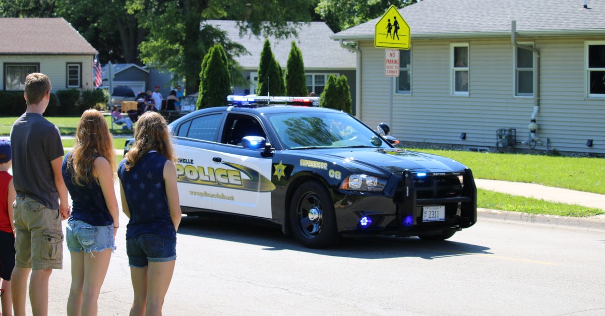 Warcraft: Orcs & Humans - Campaign and Mission Order - People Looking at Police Car Passing through Neighbourhood