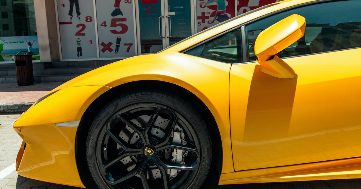 Was Super Mario Bros. 2 for the FDS a two-sided disk? - Yellow Lamborghini Car Parked on the Street