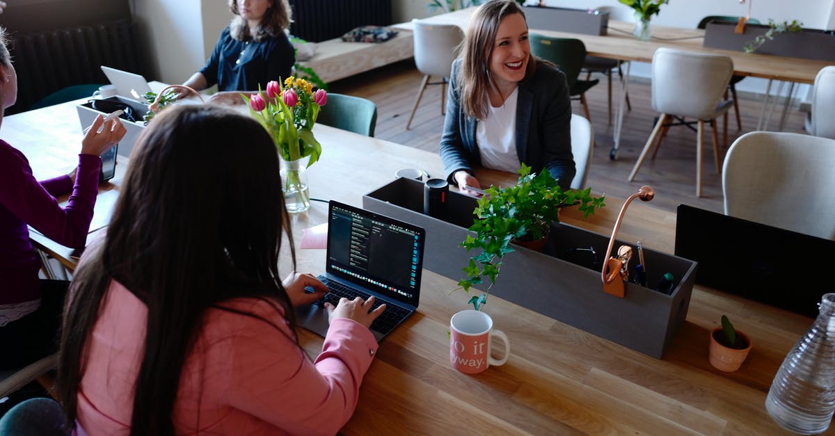 Weird pixels on the title screen on Windows 10 - Woman Sitting on the Chair Using Laptop Weird pixels on the title screen on Windows 10 - Woman Sitting on the Chair Using Laptop