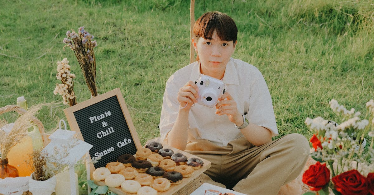 What's a good setup for Arcade Mode? - A Man Sitting on a Picnic Blanket Holding a Camera What's a good setup for Arcade Mode? - A Man Sitting on a Picnic Blanket Holding a Camera