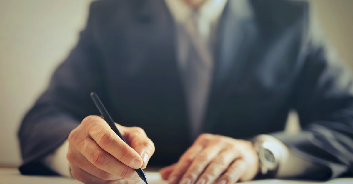 What's a good strategy for dealing with brambles? - Crop businessman signing contract in office What's a good strategy for dealing with brambles? - Crop businessman signing contract in office