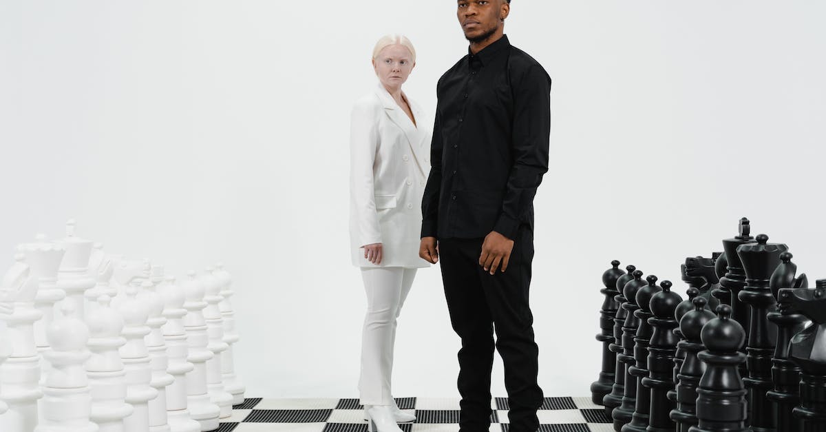 What's a good tactic to defeat Giant Piranhas? - Man and Woman Standing on Giant Chessboard