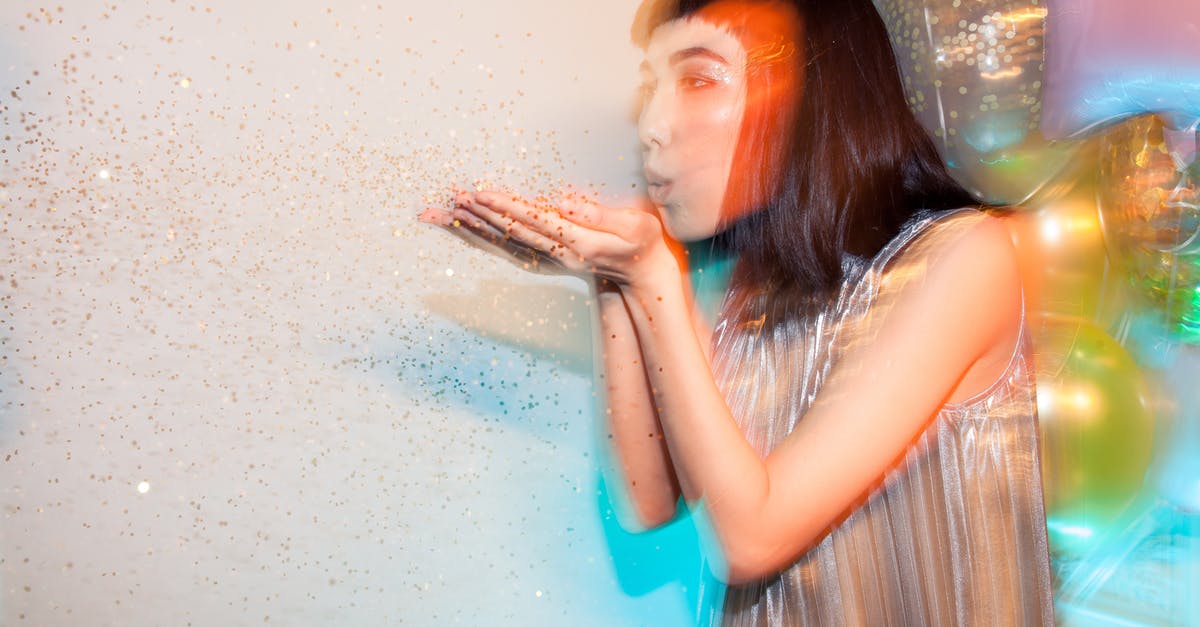 What's Happens If I Blow Up The Barrier? [closed] - Woman Blowing Glitters