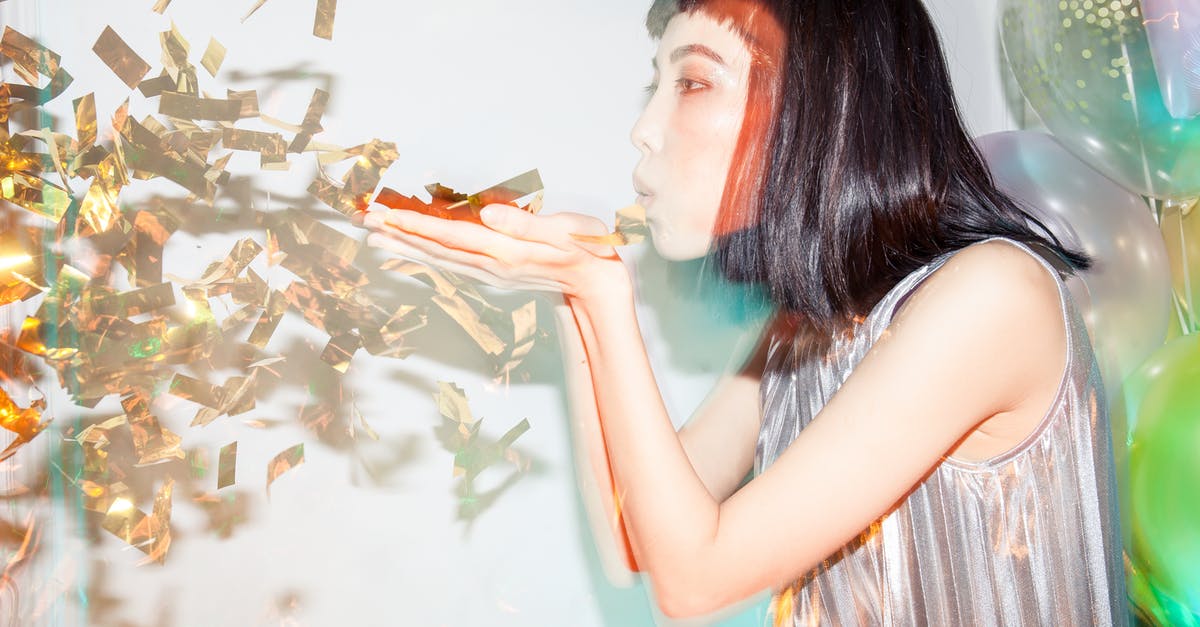 What's Happens If I Blow Up The Barrier? [closed] - Woman Blowing Confetti