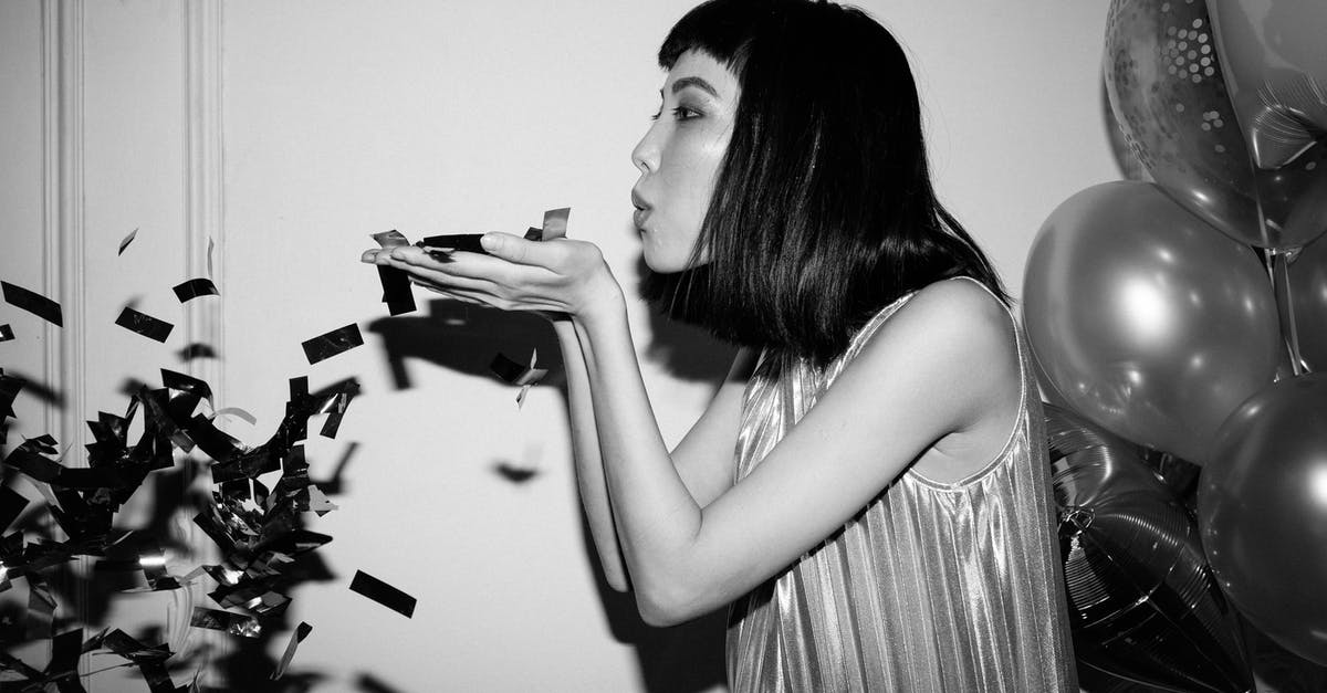 What's Happens If I Blow Up The Barrier? [closed] - Woman with Confetti on Her Hands