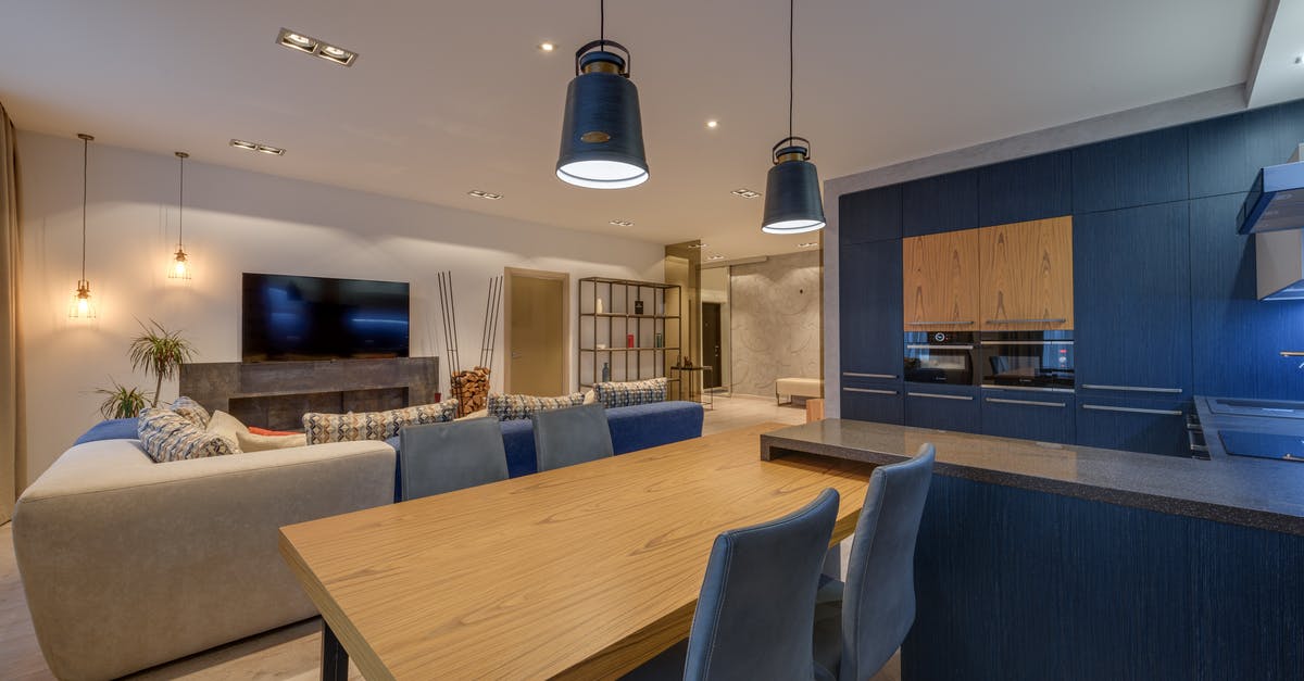 What's the difference between semaphore and electric signals? - Interior of modern lounge with kitchen illuminated with lamps in comfortable spacious apartment What's the difference between semaphore and electric signals? - Interior of modern lounge with kitchen illuminated with lamps in comfortable spacious apartment