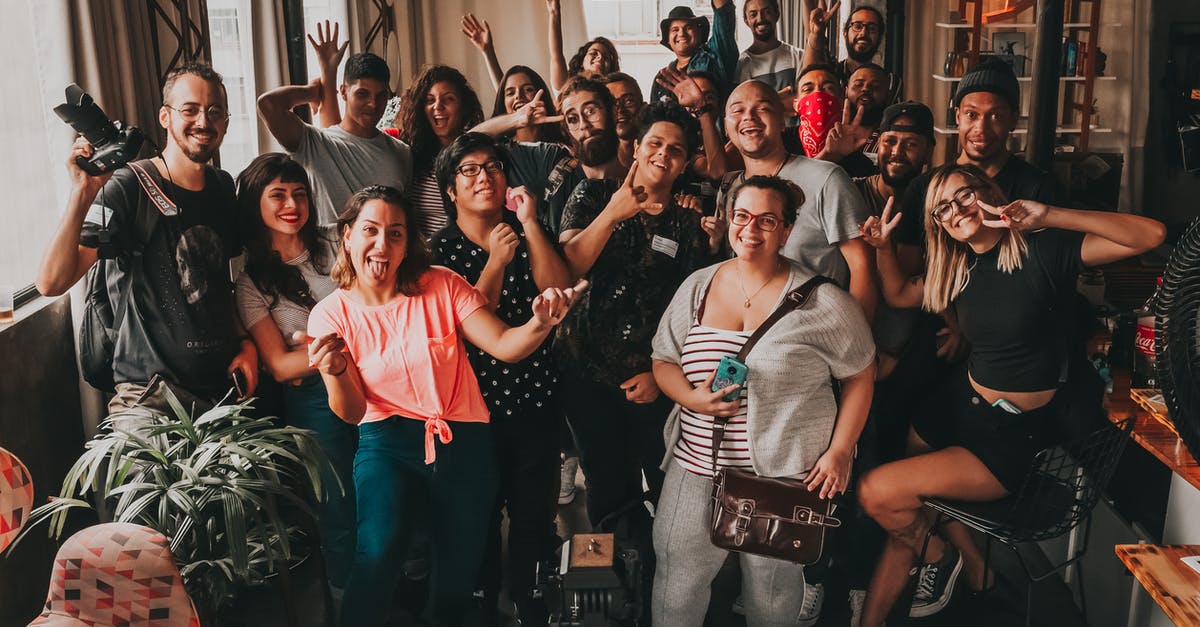 What's the genre of game where you have to look after a community that grows in real time? - Positive diverse people making faces at camera What's the genre of game where you have to look after a community that grows in real time? - Positive diverse people making faces at camera