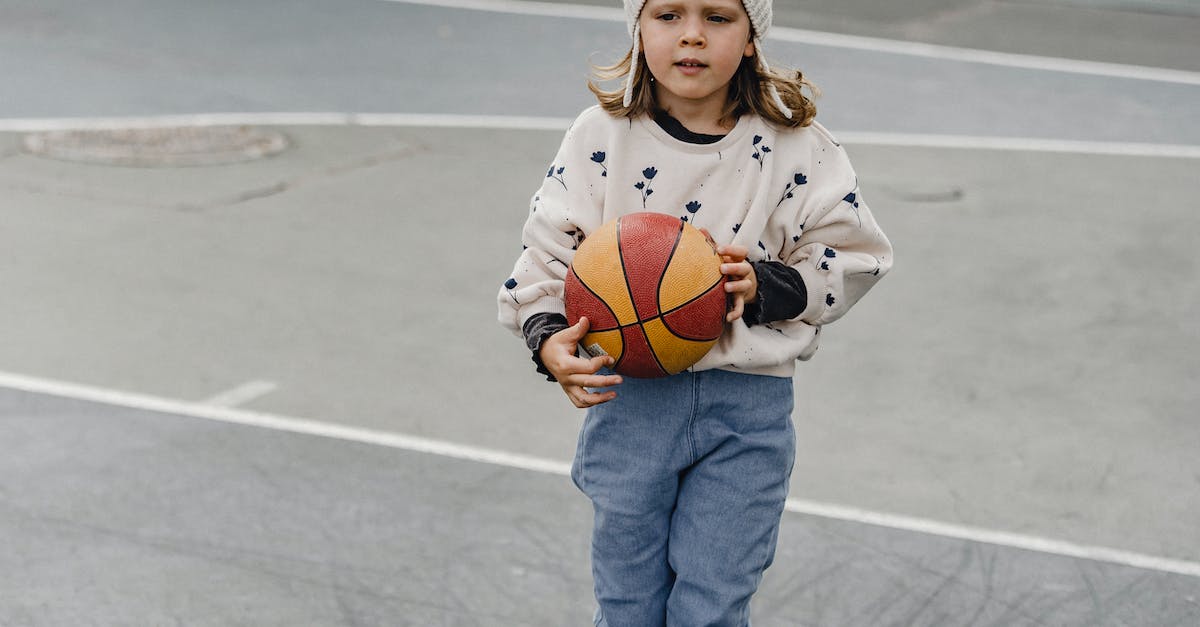 What's the genre of game where you have to look after a community that grows in real time? - Little girl with colorful ball in sports yard at daytime What's the genre of game where you have to look after a community that grows in real time? - Little girl with colorful ball in sports yard at daytime
