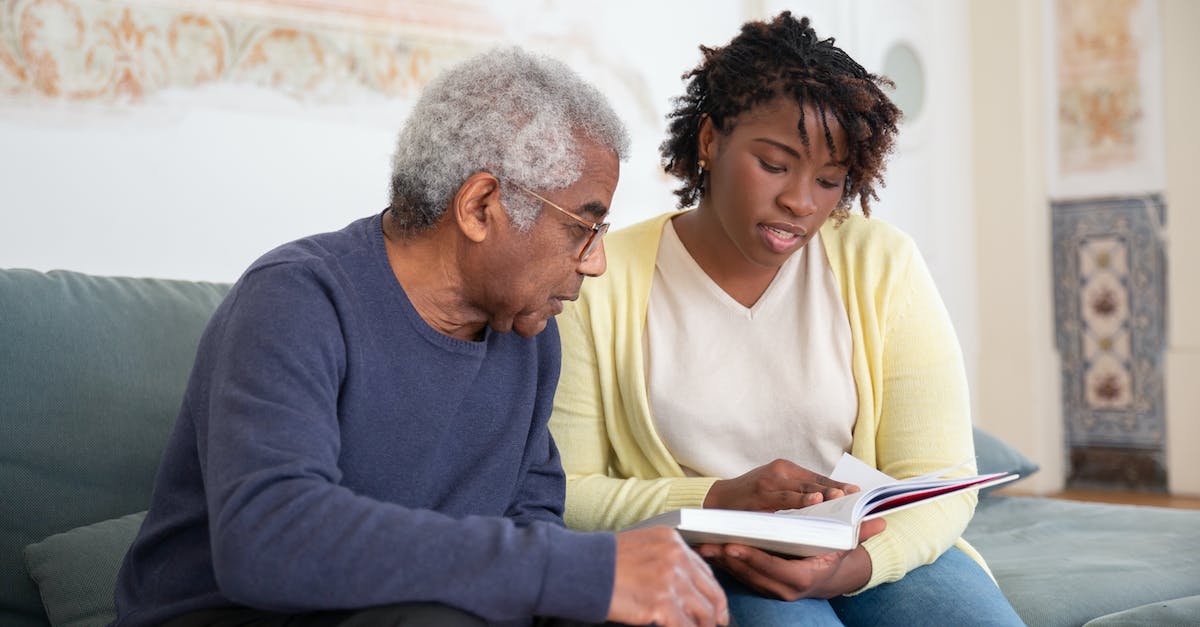 What's the lifecycle of a Tropico citizen? - Man in Blue Sweater Holding Book Beside Woman in Yellow Shirt What's the lifecycle of a Tropico citizen? - Man in Blue Sweater Holding Book Beside Woman in Yellow Shirt