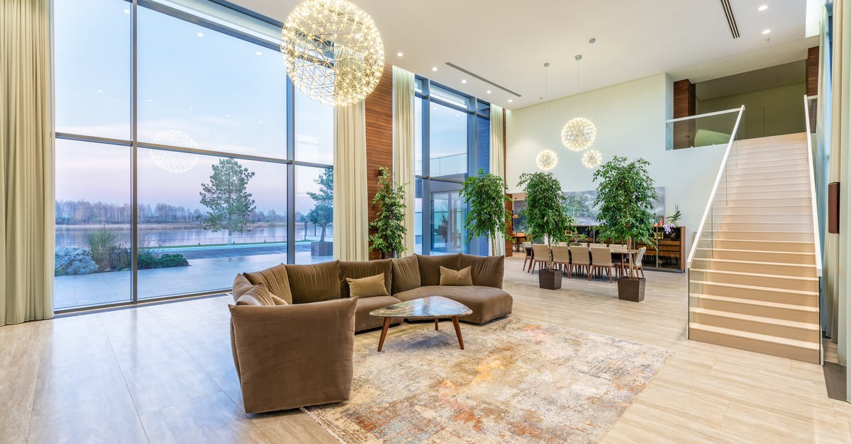 What's the max prestige for Gym? - Spacious lobby with sofa near stairs and glass transparent wall What's the max prestige for Gym? - Spacious lobby with sofa near stairs and glass transparent wall