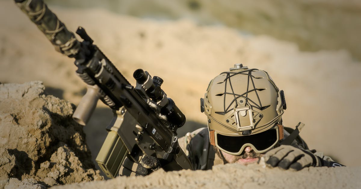 What's the point of winning more than one battle in Arid Ruins? - Soldier Wearing Brown Helmet Holding Assault Rifle during Daytime